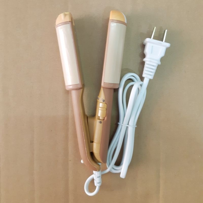 Máy Duỗi Tóc Mini Nhỏ Gọn Tiện Lợi