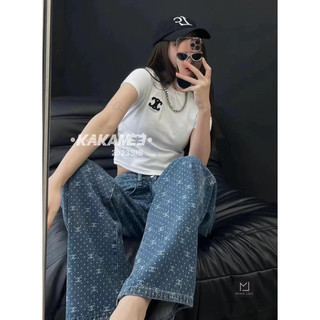 Quần jeans suông channel chấm bi