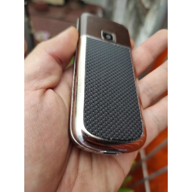 Bộ dán da nokia 8800 PU Cacbon vân nổi mịn