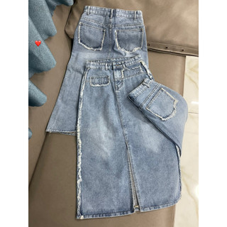 Chân váy jean dáng dài xẻ trước viền túi 2 bên tua rua