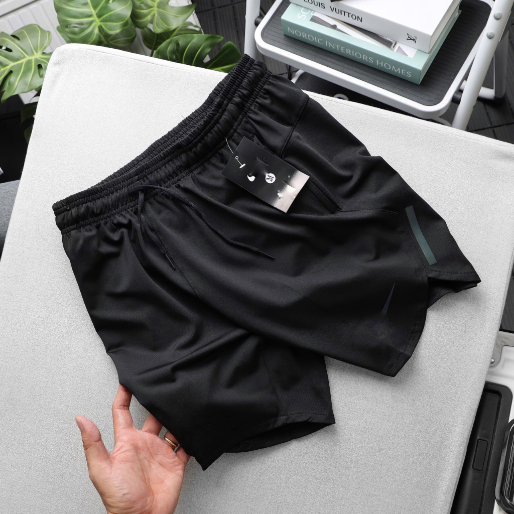 Quần Tập Gym Nam Kiểu Sẻ Tà Túi Khóa Kéo Logo Phản Quang Chất Thun Poly