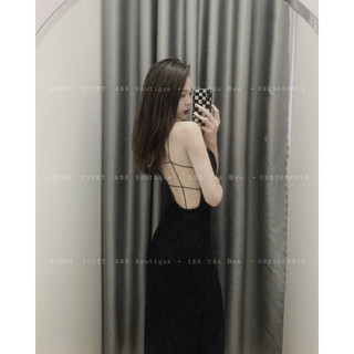 Đầm xốp hở lưng xẻ tà