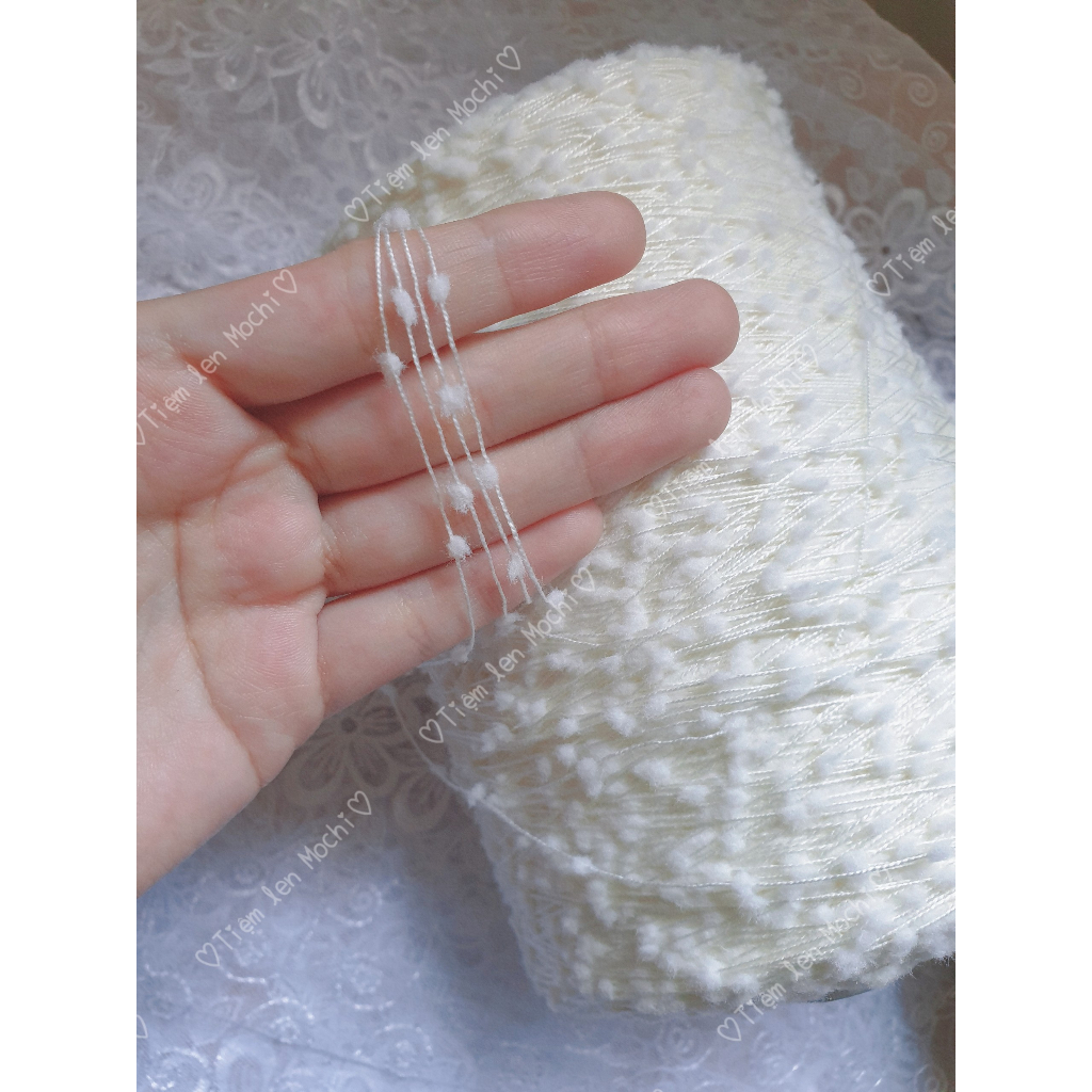 Sợi kiểu pom pom trắng