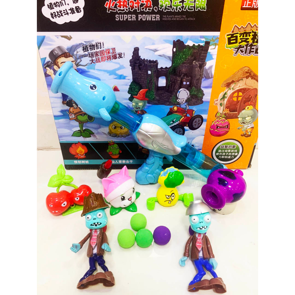 Đồ chơi súng bắn bóng thụt bóng zombie + mô hình zombie