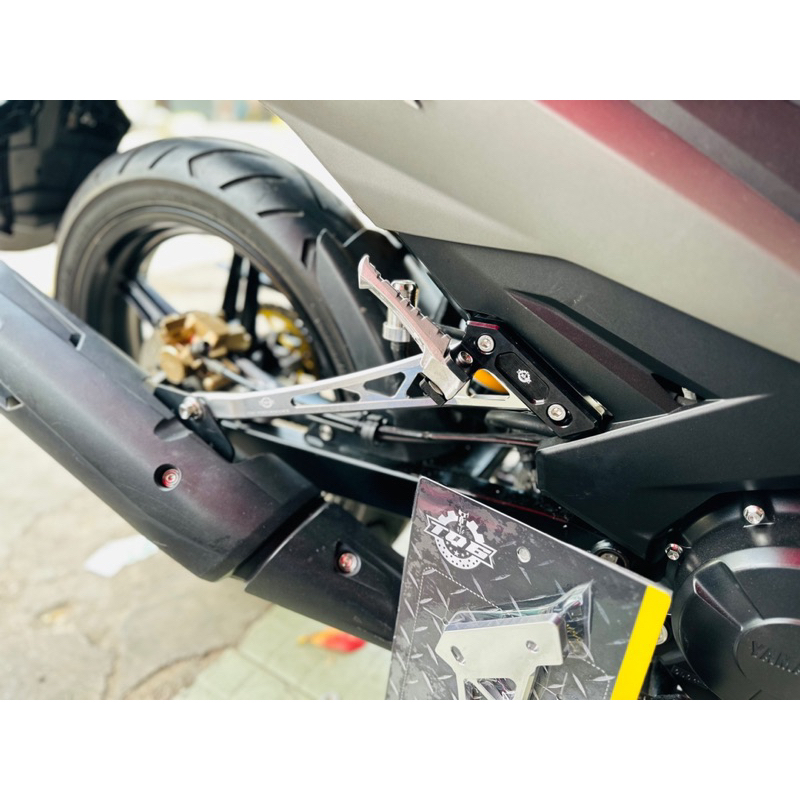 Gác chân tq6 cnc sau Ex150/155