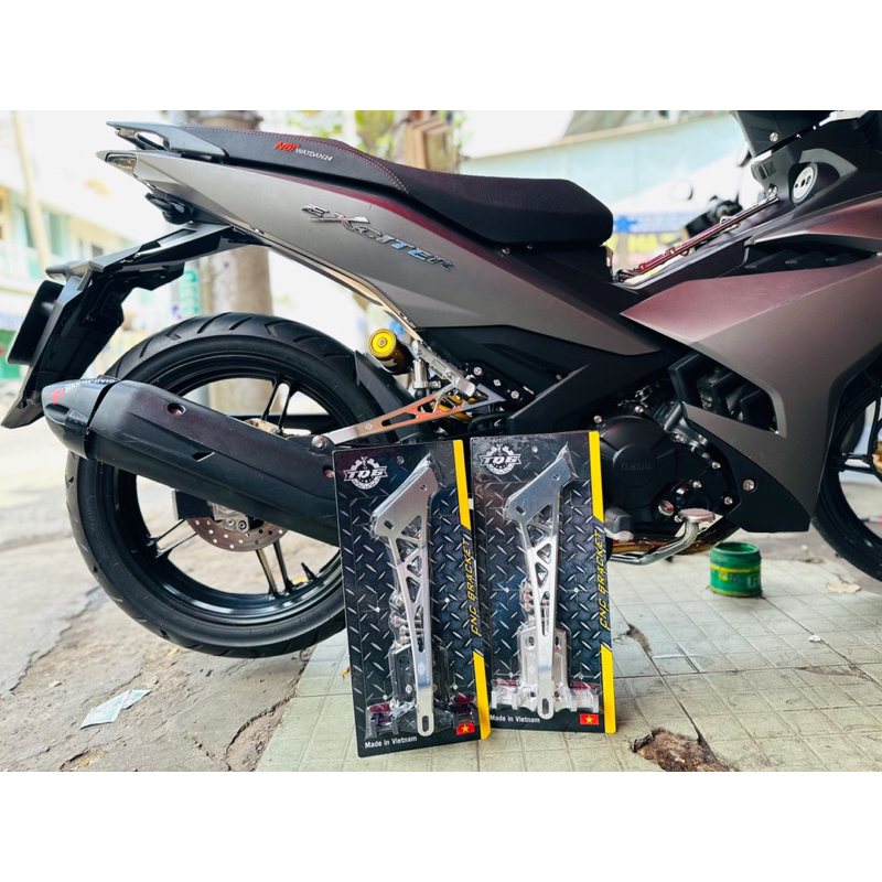 Gác chân tq6 cnc sau Ex150/155