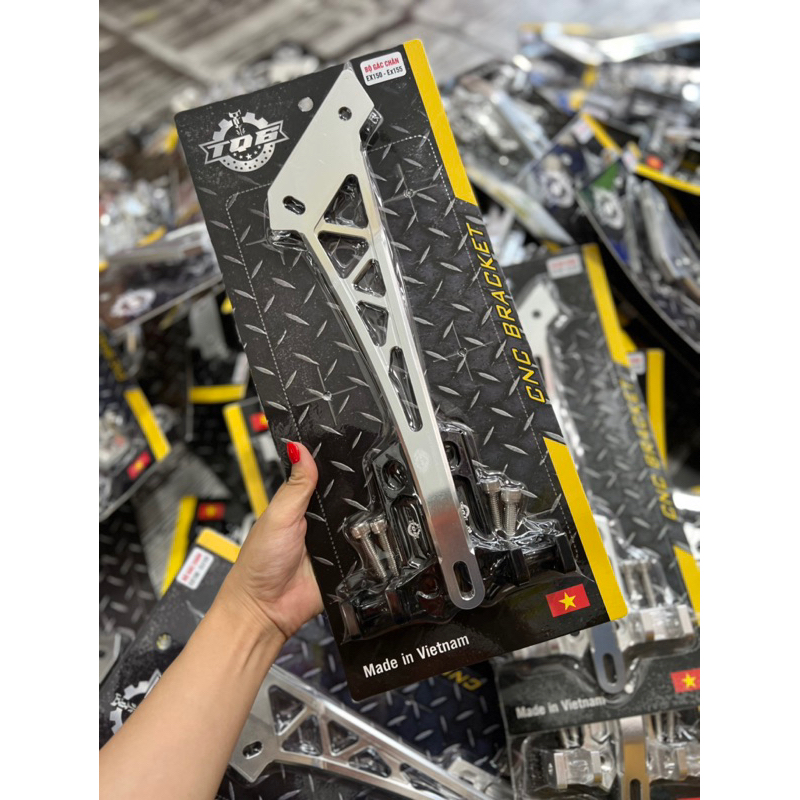 Gác chân tq6 cnc sau Ex150/155