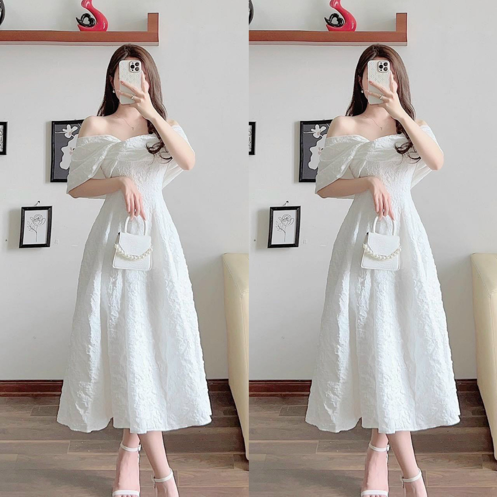 Đầm váy nữ dáng dài xòe xếp bèo vai cực kì sang trọng, cùng tone trắng tinh khôi siêu quý phái, phù hợp đi dự tiệc