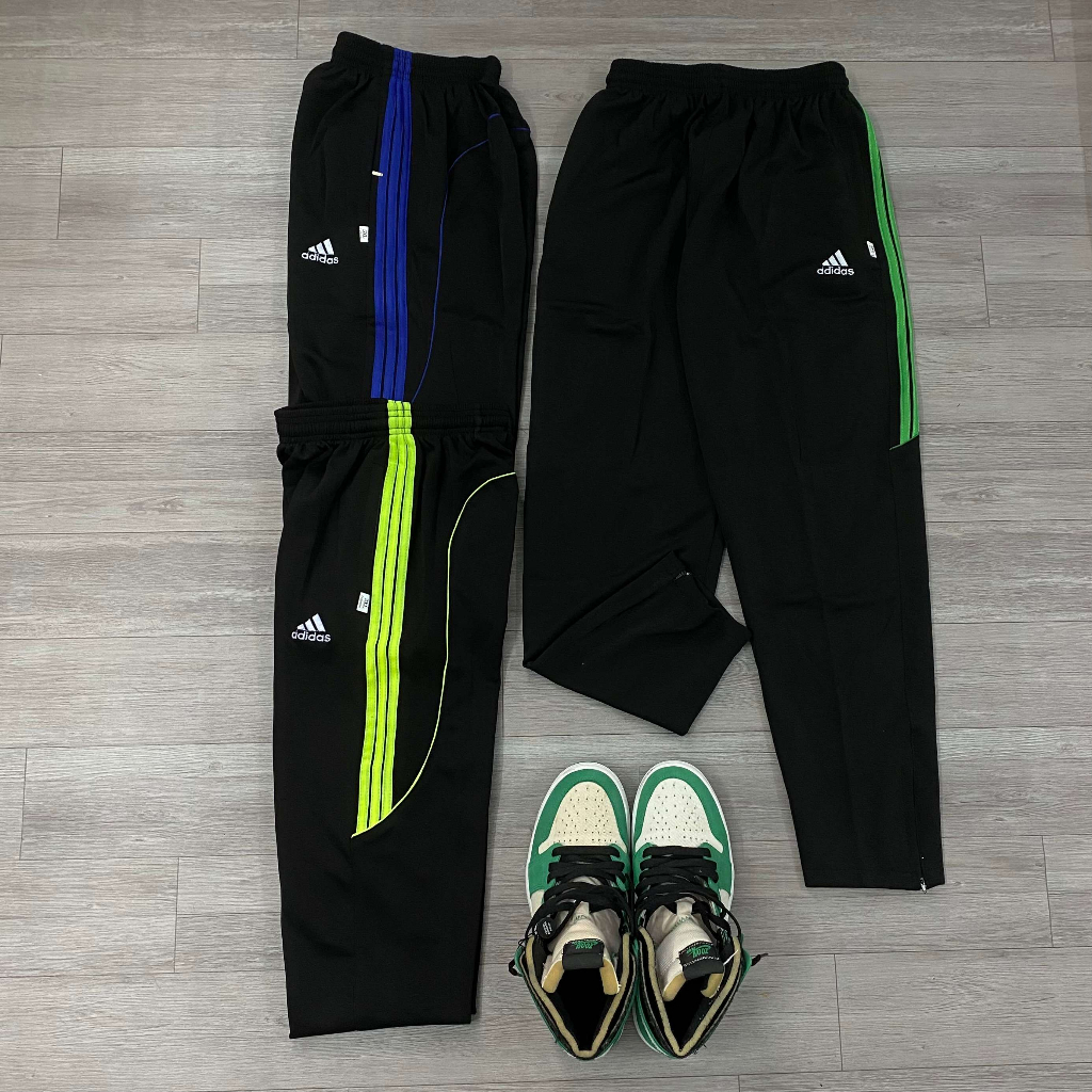 Quần dài thun Poly sọc viền dây kéo chân