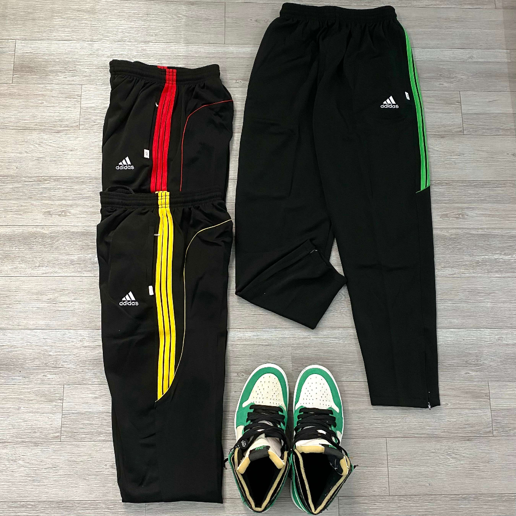 Quần dài thun Poly sọc viền dây kéo chân