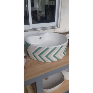 Lavabo rửa mặt đặt bàn đá hình tròn hoa văn