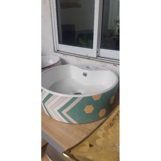 Lavabo rửa mặt đặt bàn đá hình tròn hoa văn