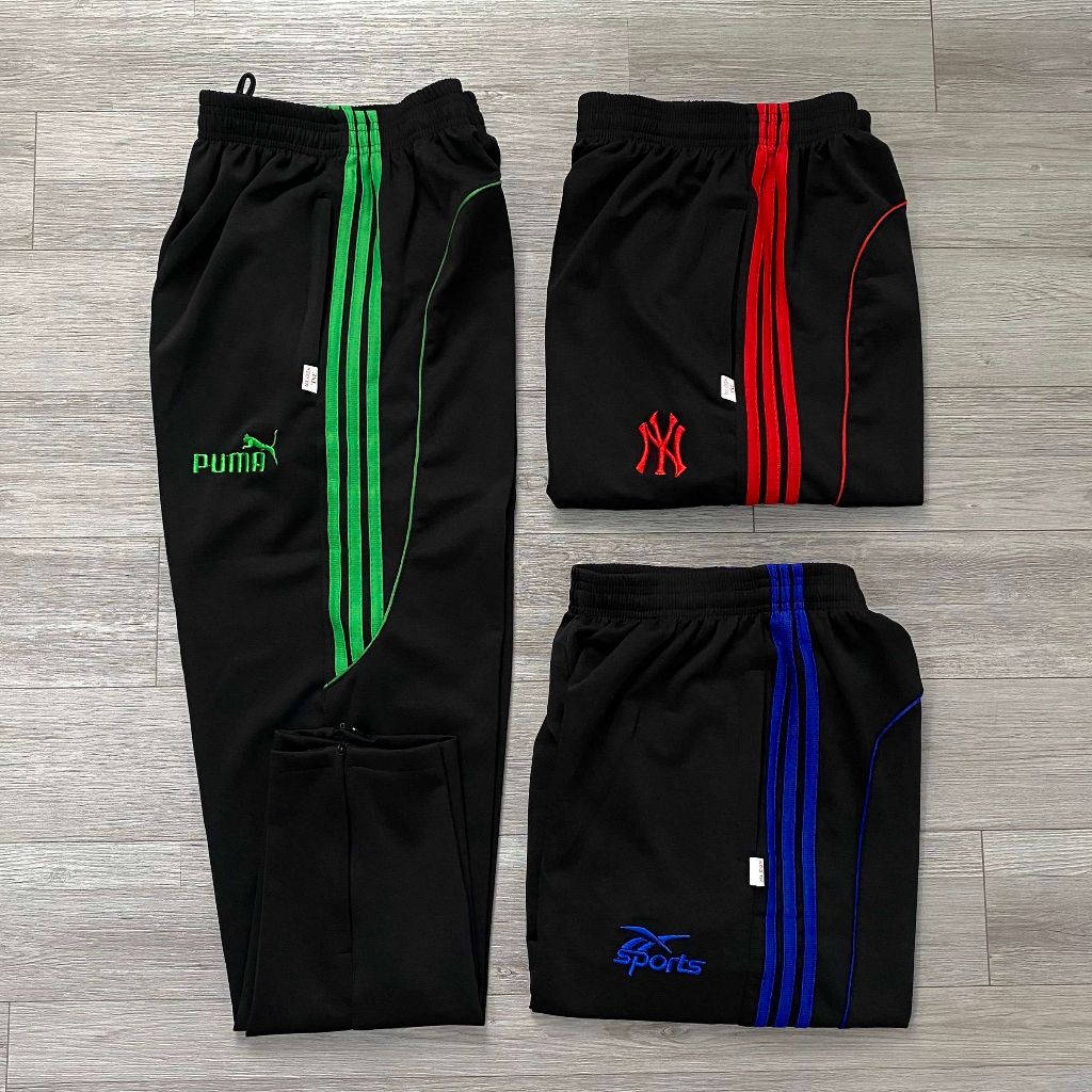 Quần dài thun Poly sọc viền dây kéo chân