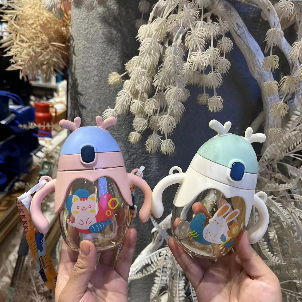 Bình tập uống nước chống sặc tai Thỏ 250ml có dây đeo cho bé