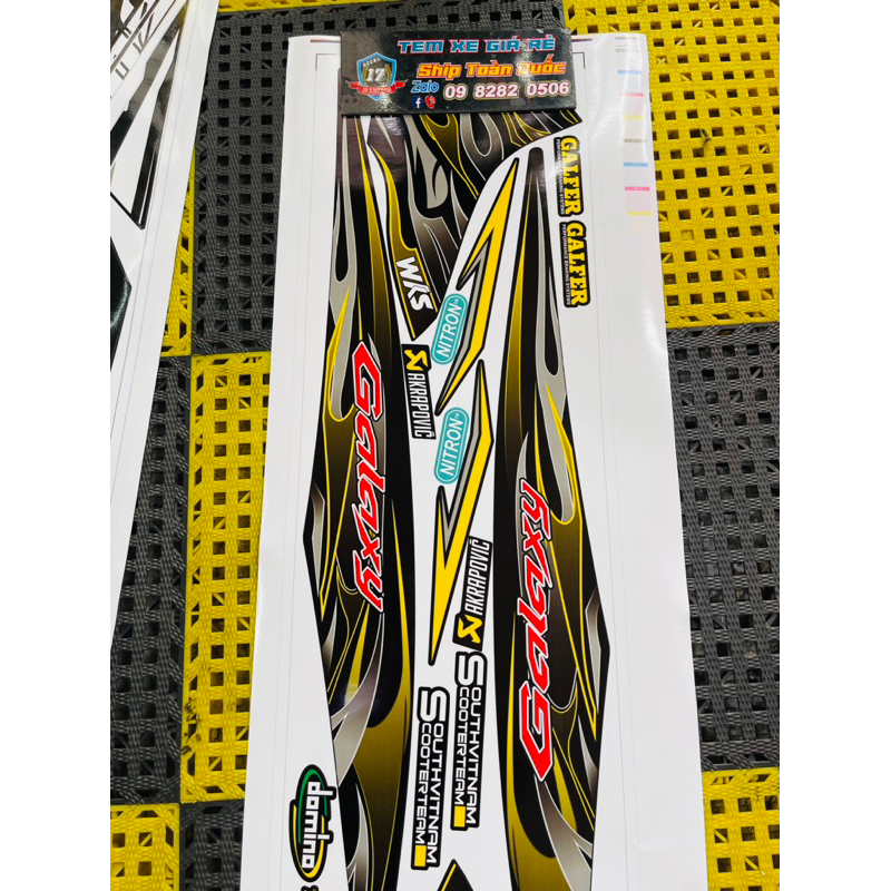 TEM XE SYM GALAXY LỬA VÀNG ĐEN