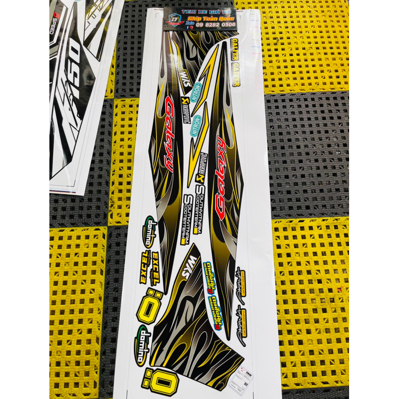 TEM XE SYM GALAXY LỬA VÀNG ĐEN