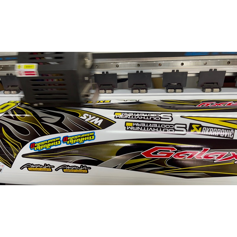 TEM XE SYM GALAXY LỬA VÀNG ĐEN