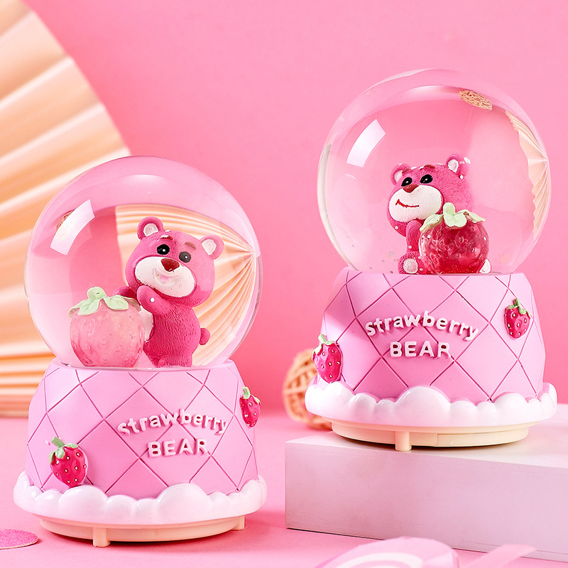 Quả cầu tuyết hình gấu dâu có hộp phát nhạc và đèn phát sáng xinh xắn