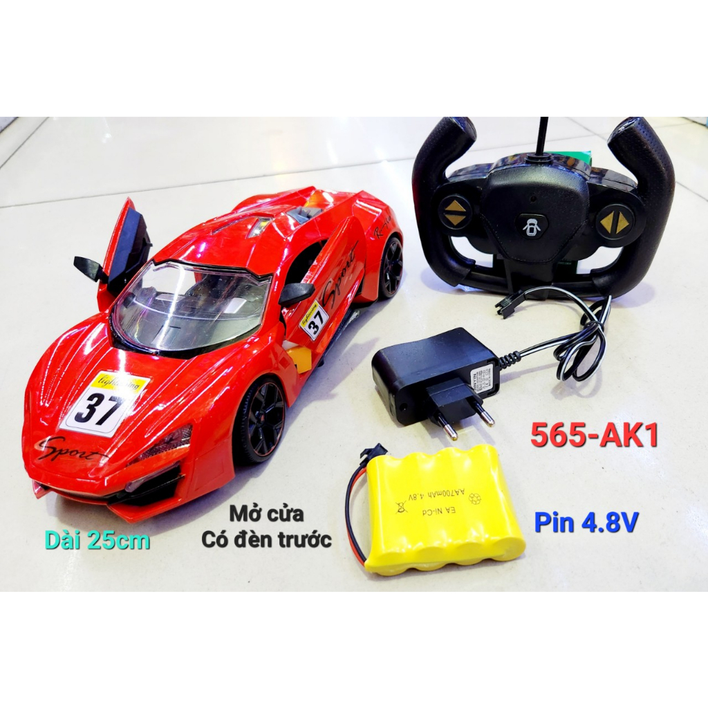 Clip test đóng hàng, 565-AK1-DO HỘP XE HƠI FERRARI MỞ CỬA ĐIỀU KHIỂN 7 Đ.TÁC CÓ SẠC, VÔ LĂNG 1:18 DÀI 25CM MÀU ĐỎ