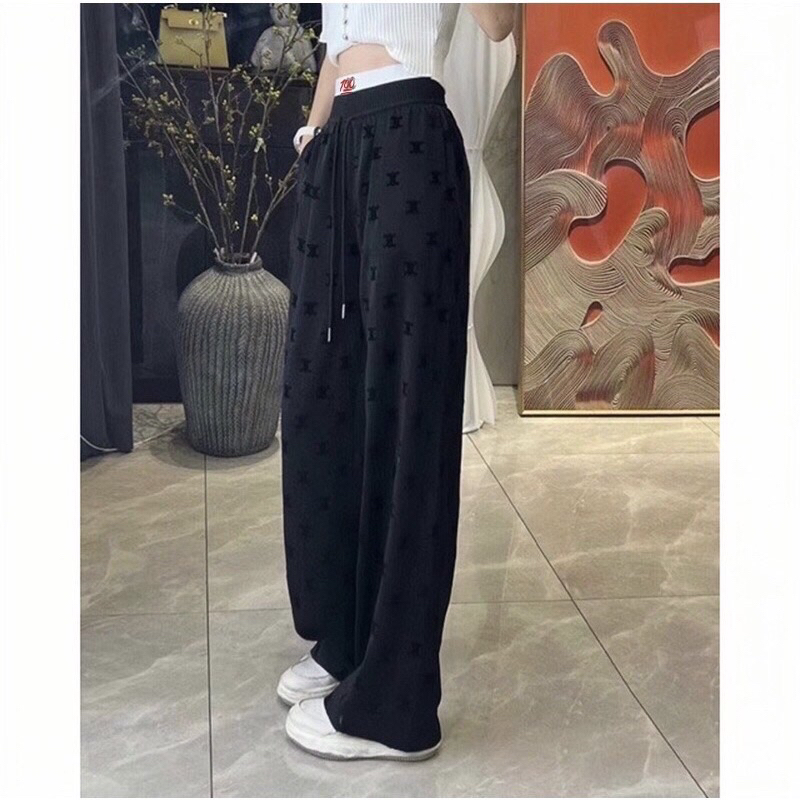 Quần ống suông rộng lụa lưng chun hình thêu nổi, chất liệu vải nhưng mềm mã Q009