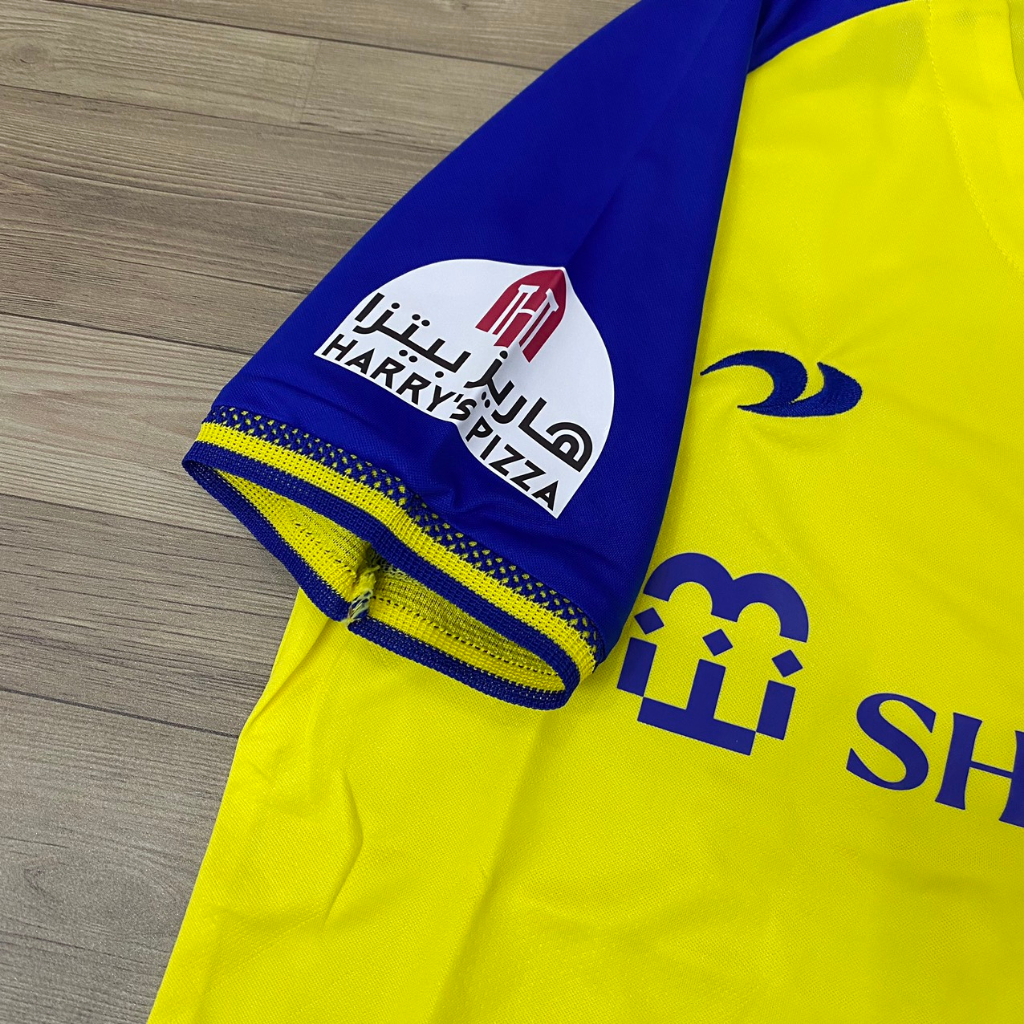 Bộ quần áo bóng đá Al Nassr vàng sân nhà F1 thun thái cao cấp FLG