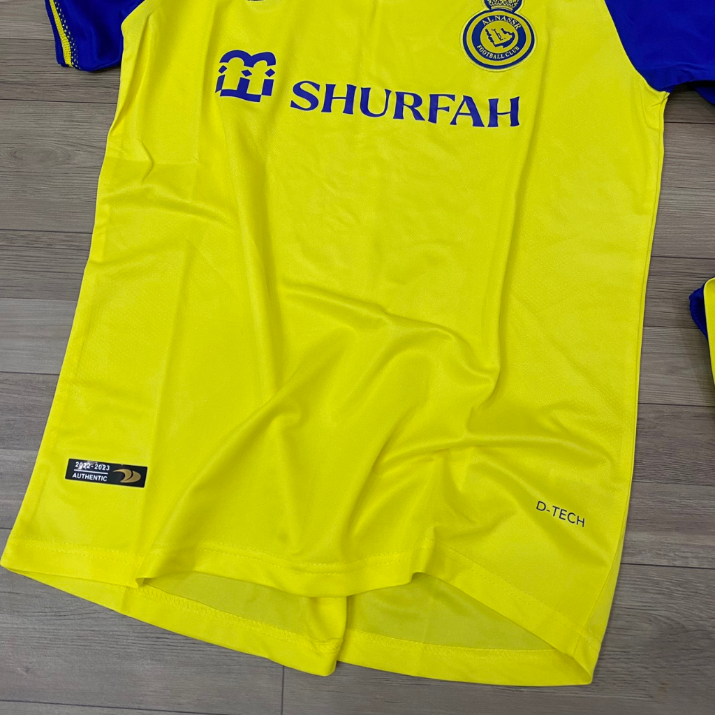 Bộ quần áo bóng đá Al Nassr vàng sân nhà F1 thun thái cao cấp FLG