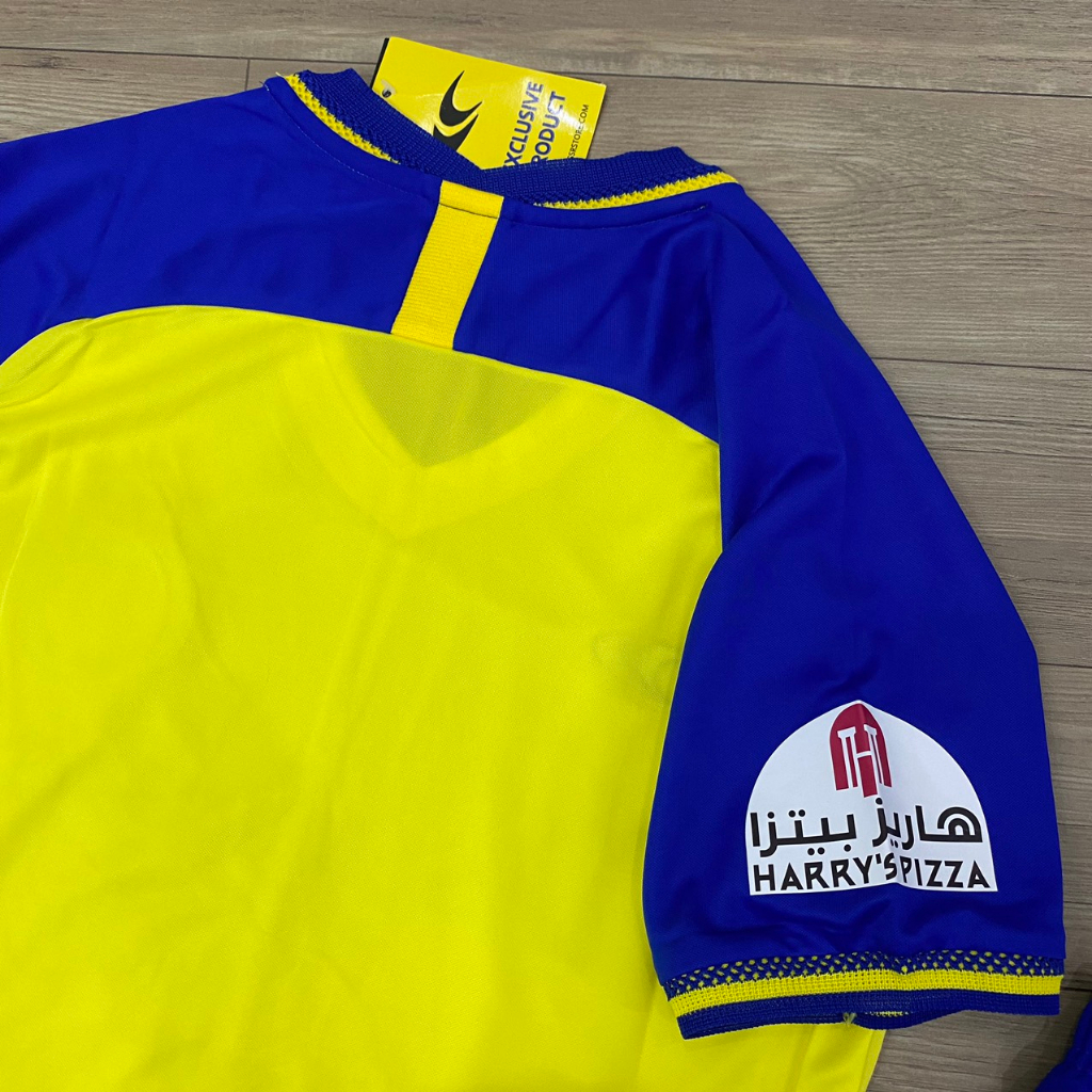 Bộ quần áo bóng đá Al Nassr vàng sân nhà F1 thun thái cao cấp FLG