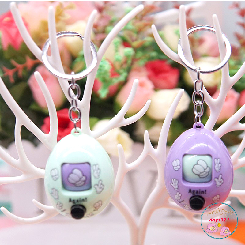 Móc khóa trứng oẳn tù tì kéo búa bao nút xoay ngẫu nhiên màu sắc kẹo ngọt đáng yêu cho bé