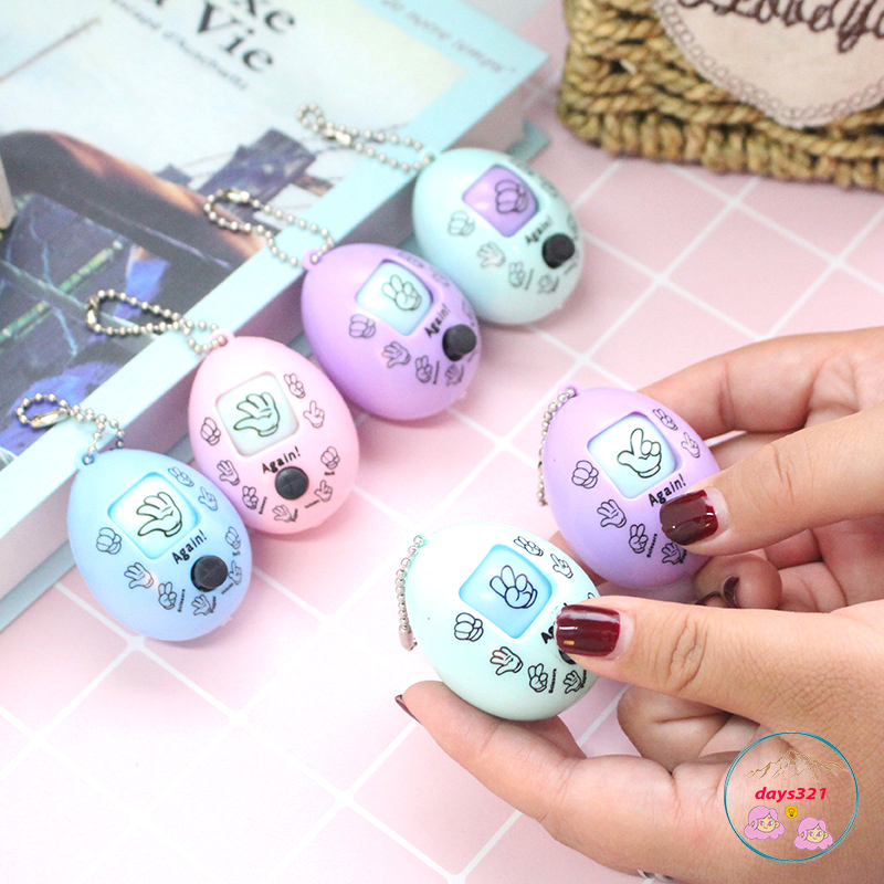 Móc khóa trứng oẳn tù tì kéo búa bao nút xoay ngẫu nhiên màu sắc kẹo ngọt đáng yêu cho bé