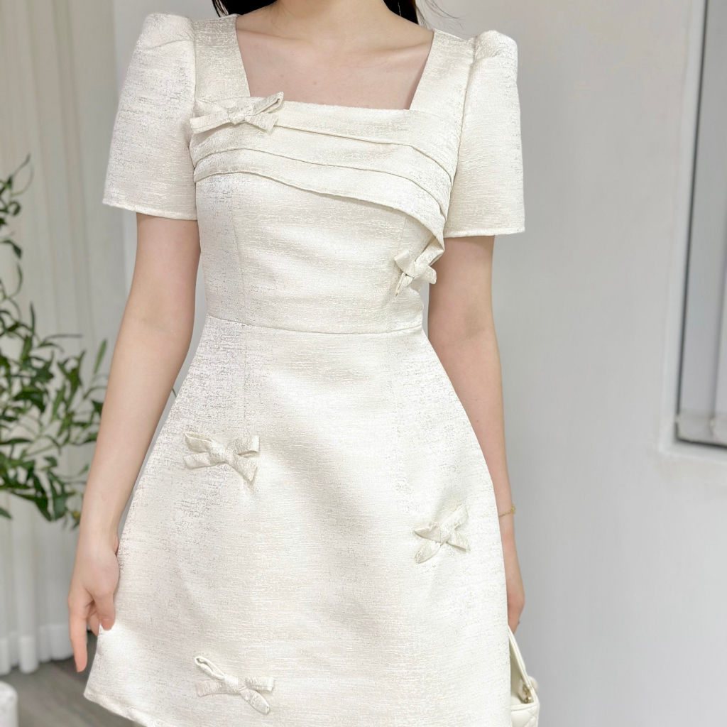 Váy nữ thiết kế chất gấm lót lụa 2 lớp họa tiết trơn đính nơ cổ cách điệu Emvy clothing V23