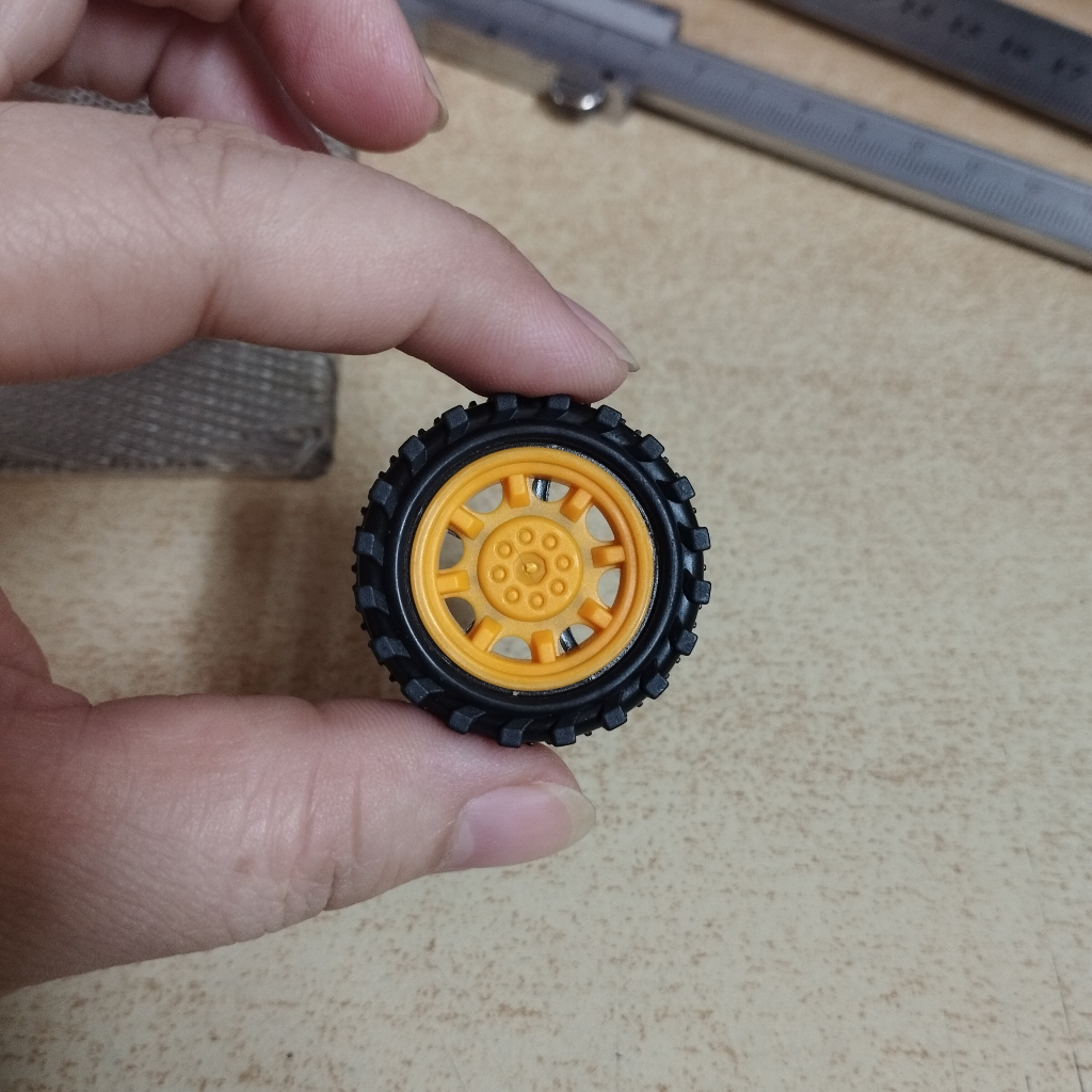 Lẻ 1 Bánh xe nhựa đường kính 34mm rộng 12mm và trục 2mm