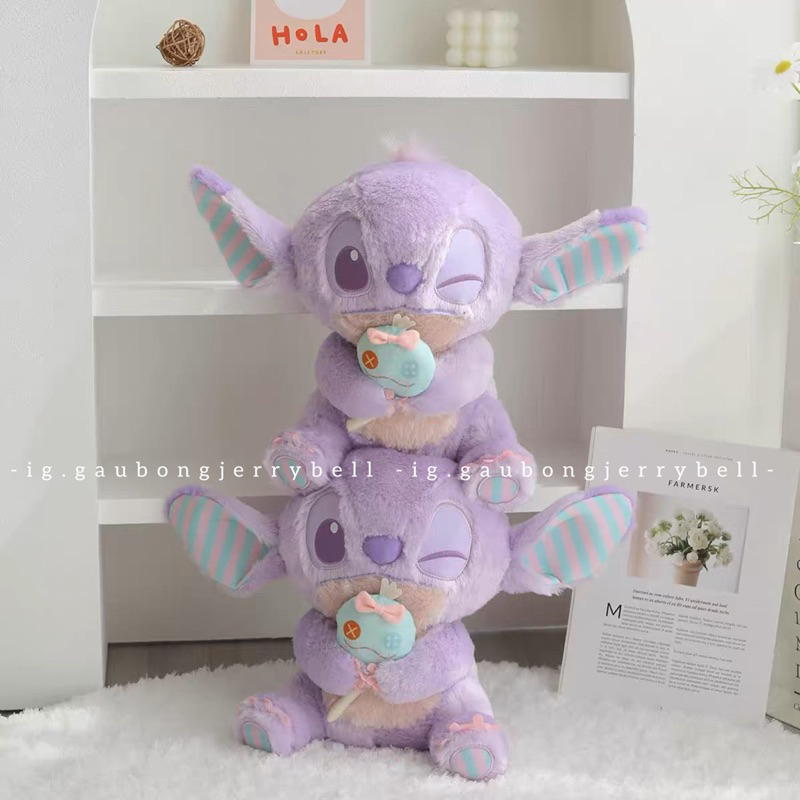 Gấu bông Stitch ôm Scrump màu tím nháy mắt