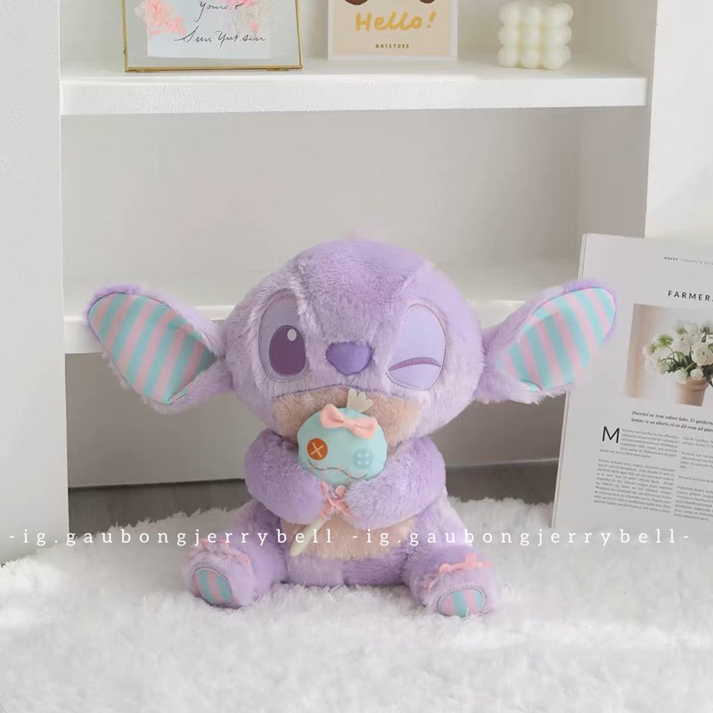 Gấu bông Stitch ôm Scrump màu tím nháy mắt