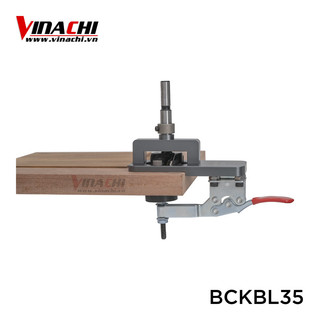 Cữ khoan bản lề bật