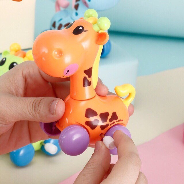 Đồ chơi hươu cao cổ chạy cót