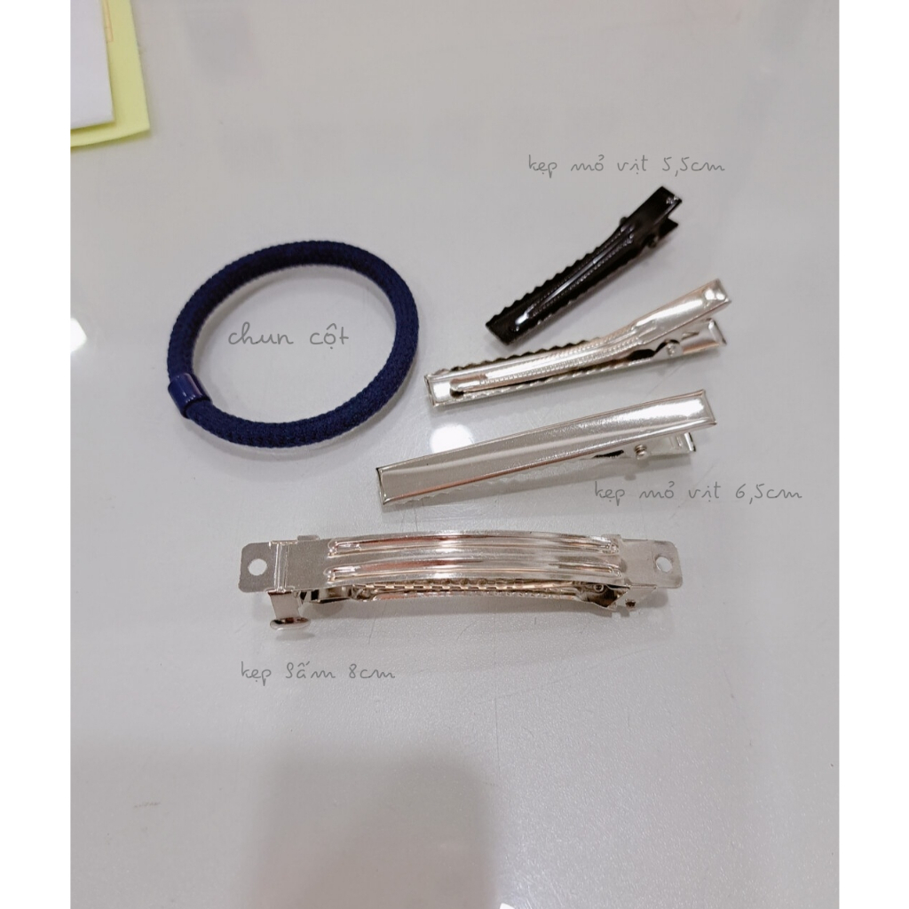 Kẹp tóc  nơ đuôi tua rua tông màu ngọt ngào