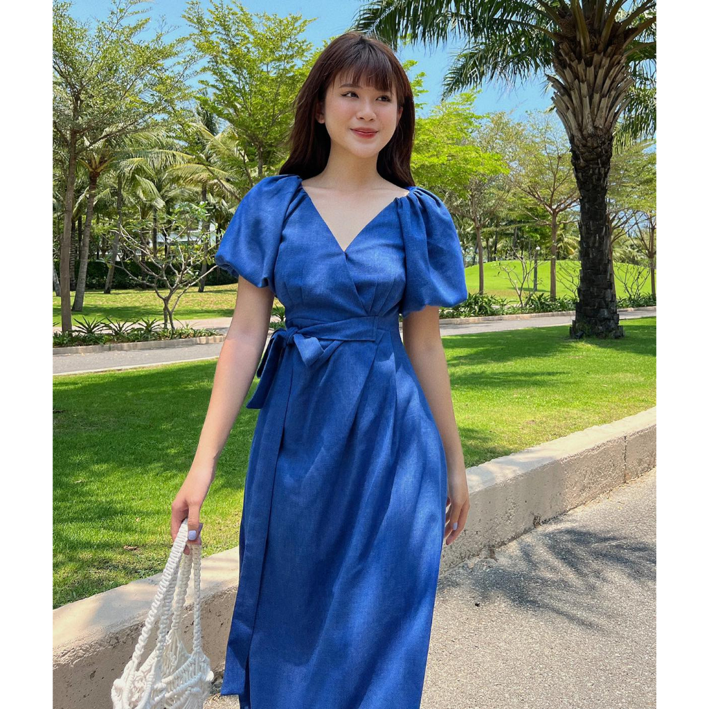 Đầm midi đắp chéo thắt nơ tay phồng thời trang GAGO màu xanh GG4297