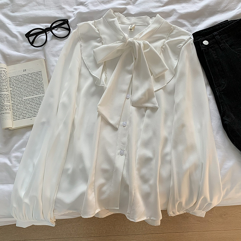 Bowtie Blouse - Áo sơ mi cổ buộc dây nơ viền đính ngọc màu trắng THE CHANCY