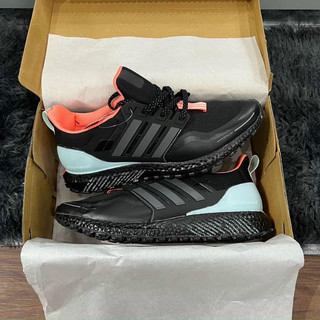 Giày sneaker ultraboost TRIP đen cam