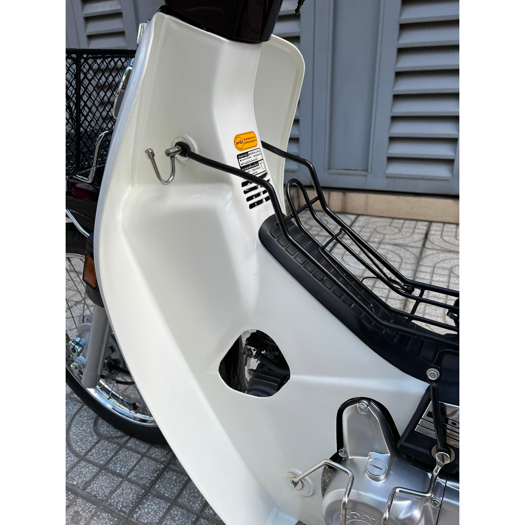 BAGA GIỮA NHÚNG NHỰA ĐEN GẮN CHO XE DREAM THÁI-SUPER DREAM