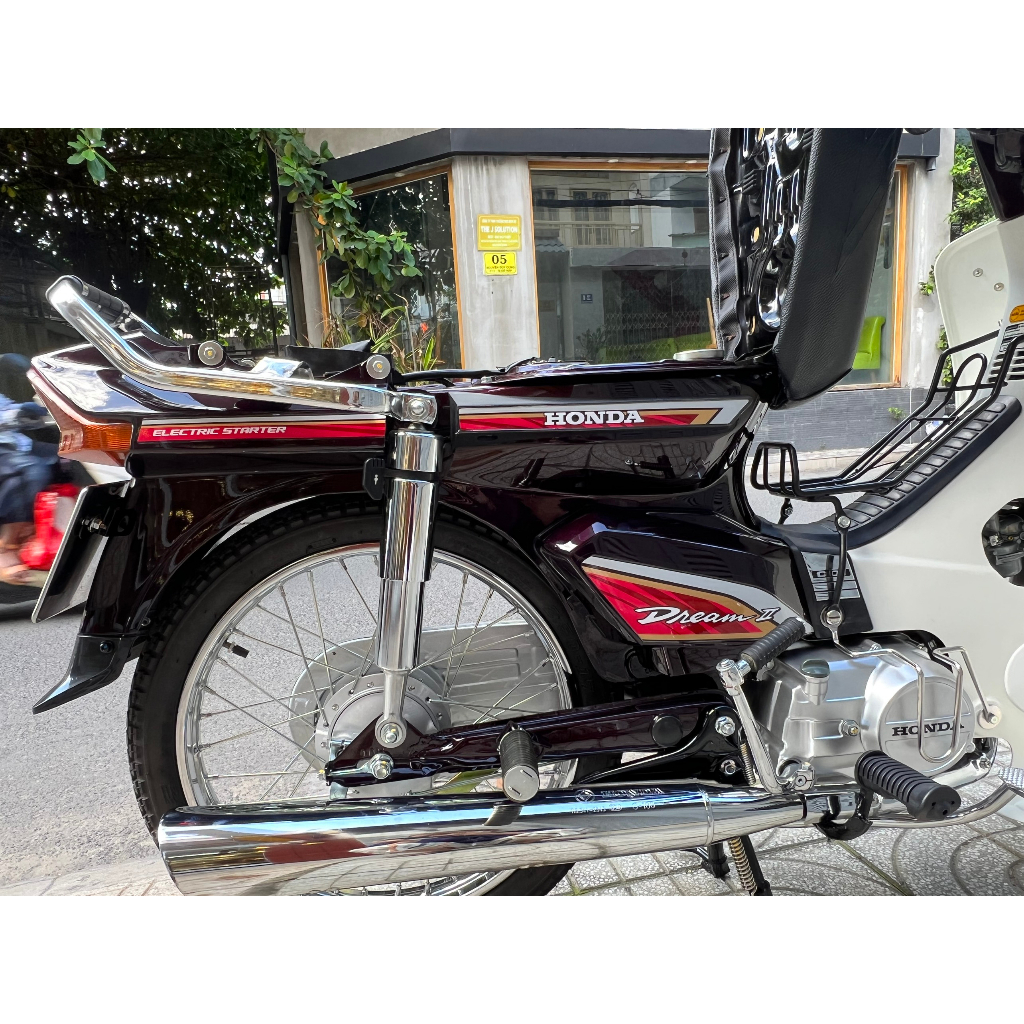 BAGA GIỮA NHÚNG NHỰA ĐEN GẮN CHO XE DREAM THÁI-SUPER DREAM