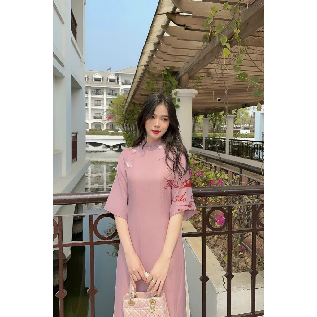 Áo dài cách tân sắc điệp dáng suông với 4 gam màu xanh cốm, hồng , tím và xanh dương nhẹ nhàng nổi bật tôn dáng