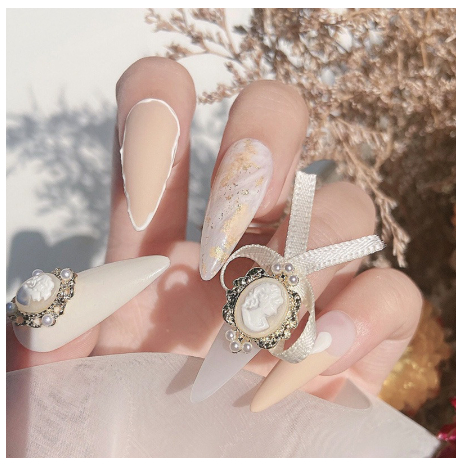 Mẫu charm nơ thiên thần trang tri móng nail  mã 20-27