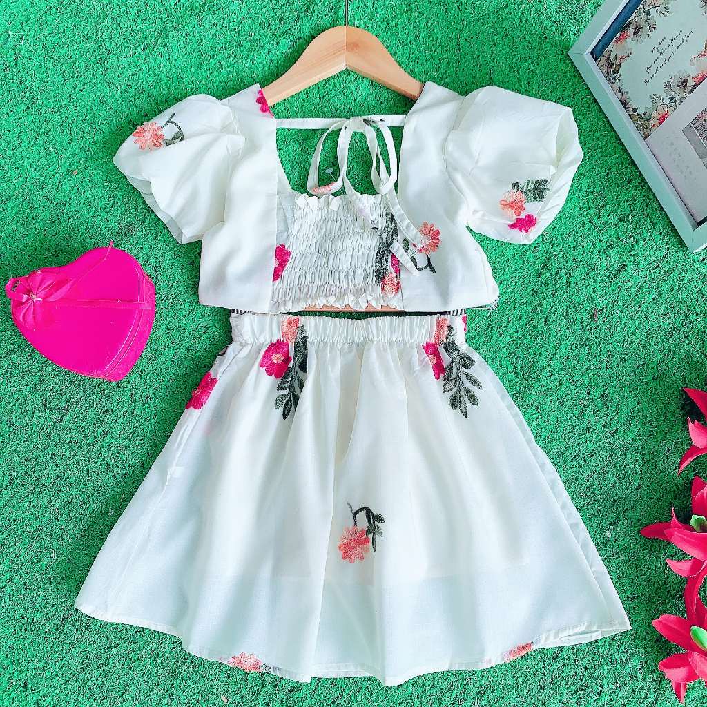 Sét váy bé gái kiểu nơ croptop cá tính vải thô boi thêu hoa xinh xắn 12kg đến 30kg