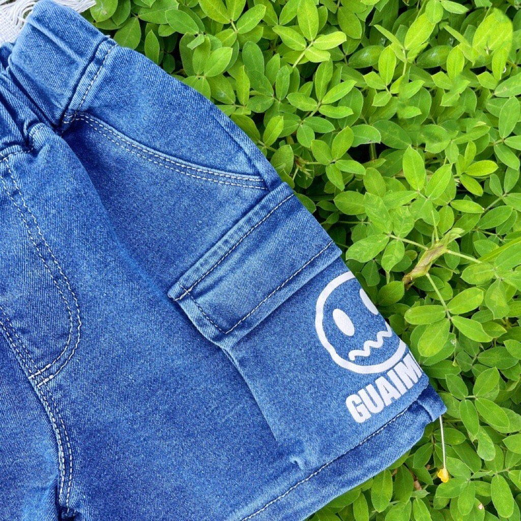 Quần sooc túi hộp mẫu tin mặt cười trên túi chó bé