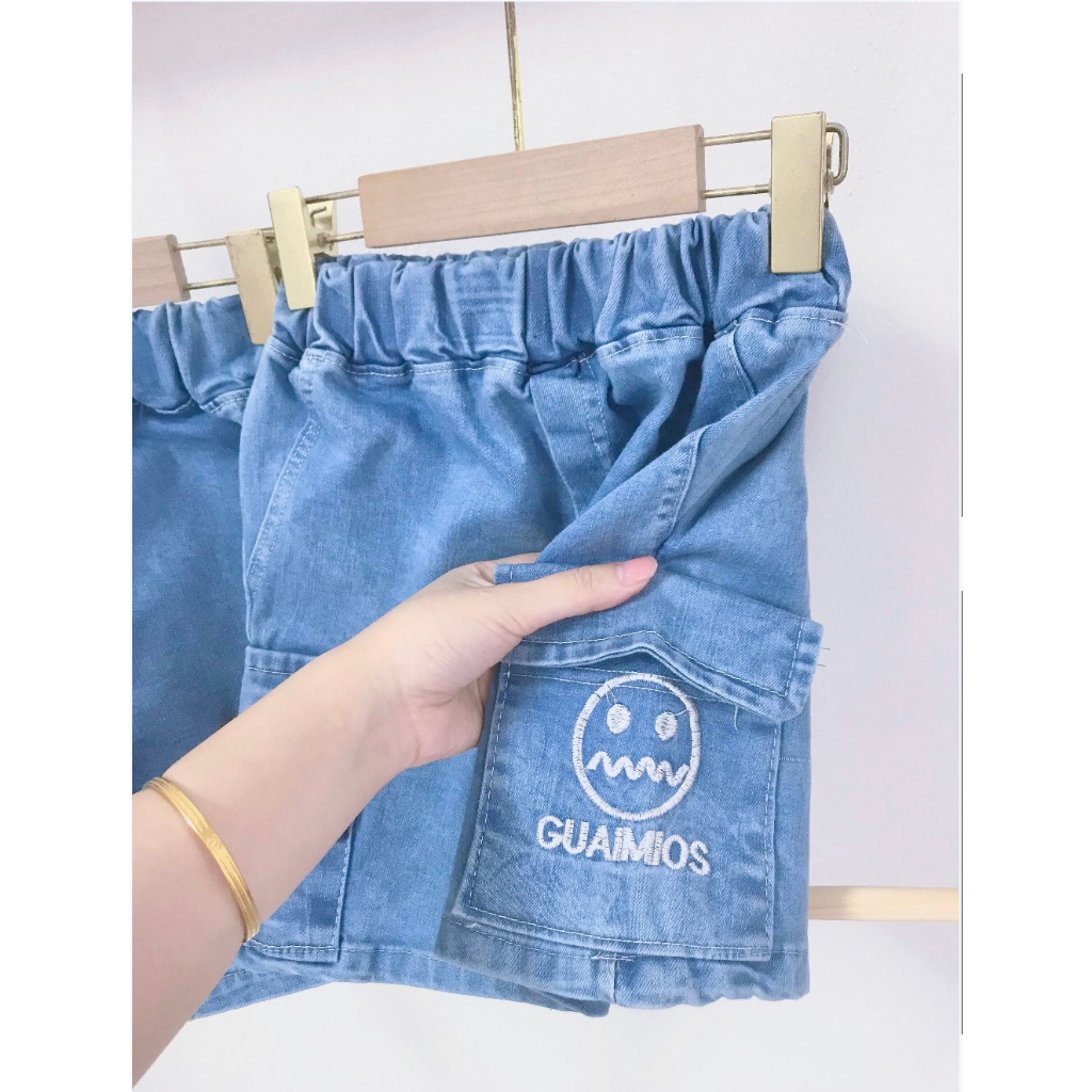 Quần sooc túi hộp mẫu tin mặt cười trên túi chó bé