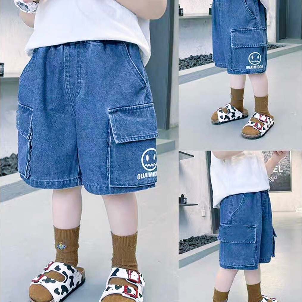 Quần sooc túi hộp mẫu tin mặt cười trên túi chó bé