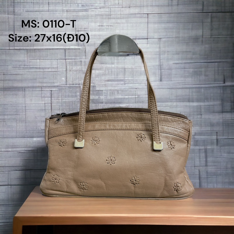 Túi si da thật hoá tiết cắt hoa