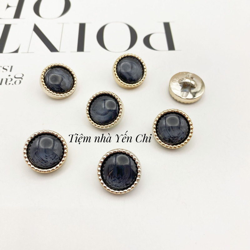 1 Khuy (cúc) nhựa Ngọc đen mắt mèo cỡ 1.8cm , 2.3cm và 2.5cm MS11217