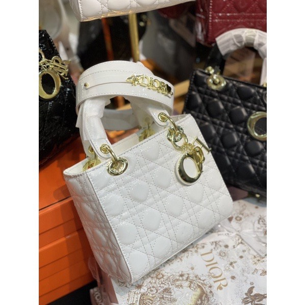 Túi xách Di.or size 20cm da lì tag vàng đế đinh hàng cao cấp.